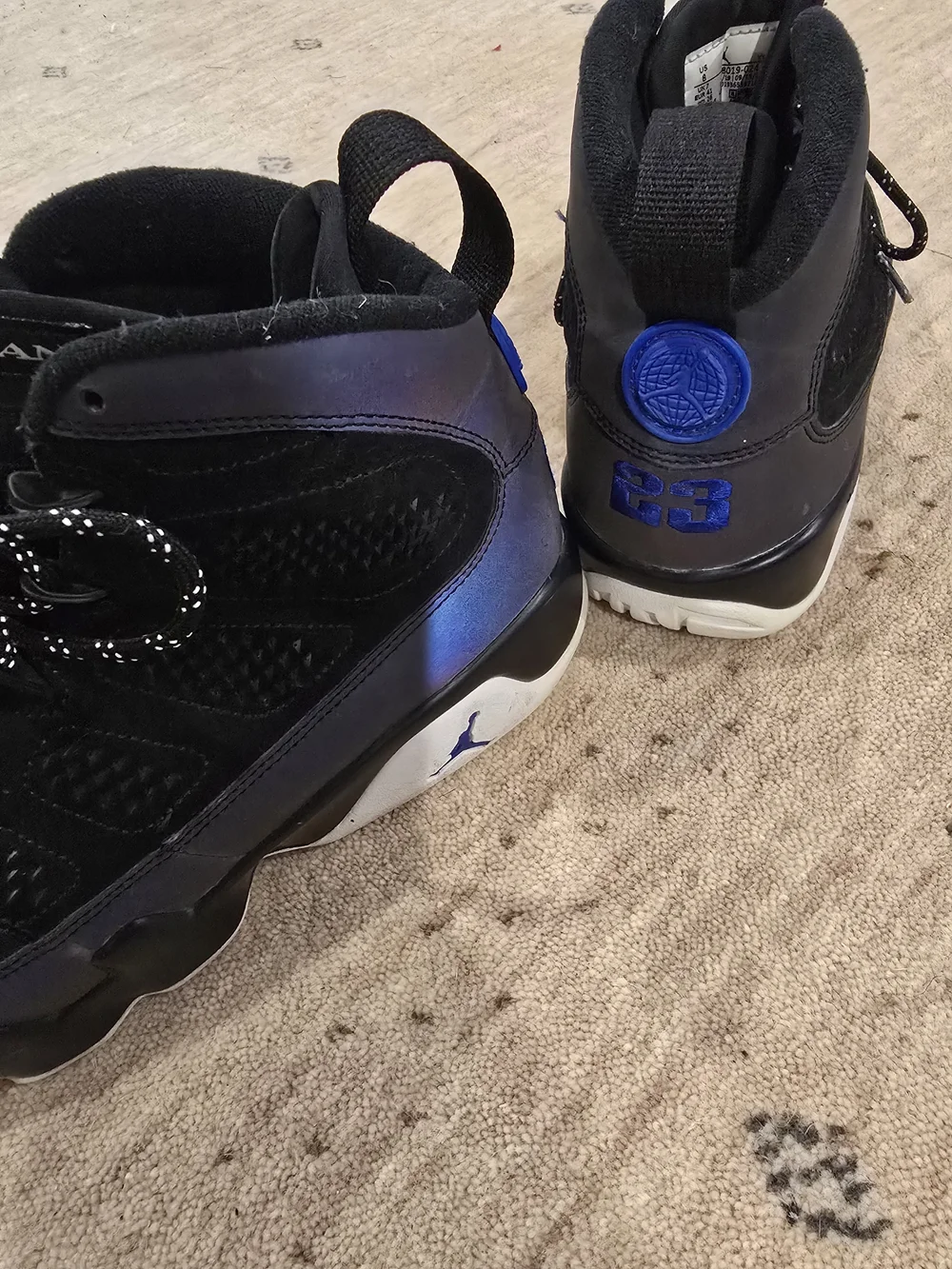 Air Jordan Black Suede High-Top Sneakers with Blue Accent